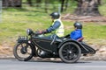 Vintage Motorcycle with sidecar on country road