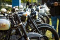 Vintage motorcycles stand in a row Royalty Free Stock Photo