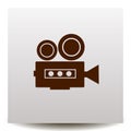 Vintage movie camera vector Icon on a realistic paper background Royalty Free Stock Photo