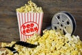 Vintage movie reel with popcorn