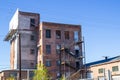 Vintage Multi Story Brick Buildings With Boarded Up Windows