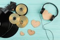 Vintage musical devices and wooden hearts. Royalty Free Stock Photo