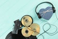 Vintage musical objects on wooden background. Royalty Free Stock Photo