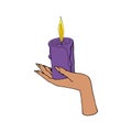 Vintage Mystic female Hand holding lit candle.