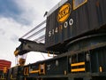 Railroad crane with sky background