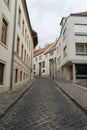 Vintage Narrow street paved with stones, Budapest, Hungary. Old Urban concept Royalty Free Stock Photo