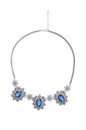Vintage necklace with blue gems on a white background Royalty Free Stock Photo