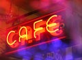 Vintage Neon Cafe Sign With Colorful Bokeh Royalty Free Stock Photo