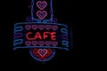 Vintage Neon Cafe Sign on Small Town Restaurant at Night