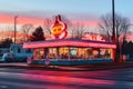 vintage neon diner sign glowing at twilight Royalty Free Stock Photo