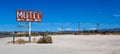 A vintage neon motel sign in the desert Royalty Free Stock Photo