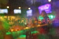 Vintage Neon Sports Bar Sign on Rainy Window with blurred background Royalty Free Stock Photo