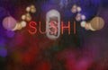 Vintage Neon Sushi Sign in Wet Window with Japanese Sushi Lantern in background Royalty Free Stock Photo