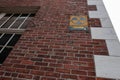 Vintage nuclear fallout sign seen fixed to a building in a US eastern town.