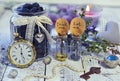 Vintage objects, tiny bottles with labels eat me and drink me, old clocks, key and honey berry in jar