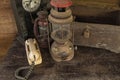 Vintage oil lamp ,old wooden box and alarm clock on old wooden touch-up in still life concept Royalty Free Stock Photo