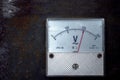 Vintage old analog volt meter scale of measurement device