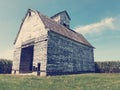 Vintage old barn in a corn field Royalty Free Stock Photo
