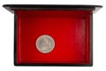 vintage old black and red casket with silver dollar coin Royalty Free Stock Photo