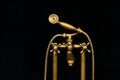 Vintage Old Brass Water Tap With Shower Head Isolated On Black B