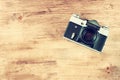 Vintage old camera on brown wooden background. room for text. Royalty Free Stock Photo