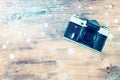 Vintage old camera on brown wooden background. room for text. Royalty Free Stock Photo