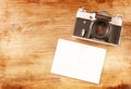 Vintage old camera and postcard Royalty Free Stock Photo