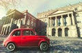 Vintage Old Classic Italian Red Car. Osgoode Hall, Historic Building. Toronto, Canada