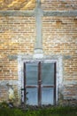 Vintage old door with brick wall. Front view of the entrace Royalty Free Stock Photo