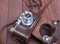 Vintage old film photo-camera in leather case Royalty Free Stock Photo