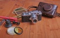 Vintage old film photo-camera in leather case Royalty Free Stock Photo