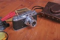 Vintage old film photo-camera in leather case Royalty Free Stock Photo