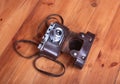 Vintage old film photo-camera in leather case Royalty Free Stock Photo