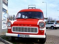 Vintage old FORD van in red and white. frontal view