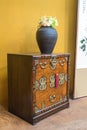 vintage(old) furniture in the luxury living room(gold wall, marble stone, wood frame) at the day light. Royalty Free Stock Photo