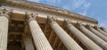 Vintage Old Justice Courthouse Column. Neoclassical colonnade with corinthian columns as part of a public building Royalty Free Stock Photo