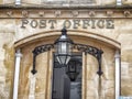 Vintage old post office building with sign on entrance Royalty Free Stock Photo