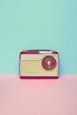 Vintage old radio on pastel background. Royalty Free Stock Photo