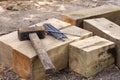 Vintage old rusty hammer and nails lying on wooden bars Royalty Free Stock Photo