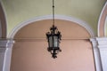 Vintage Old Street Classic Iron and Glass Lantern On The House Wall, Close Up