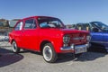 Vintage old-timer red Italian Fiat car.