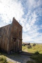 Vintage old west abandoned buildings and wagon in ghost town Bodie, California Royalty Free Stock Photo