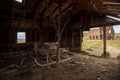 Vintage old west wooden sleigh, abandoned buildings and path in ghost town Bodie, California Royalty Free Stock Photo