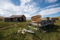 Vintage old west wooden sleigh and workshop buildings in ghost town of Bodie, California Royalty Free Stock Photo