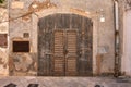 Vintage Old Wooden Door With Ancient Textured Walls