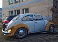 Vintage oldtimer veteran old classic ro car white and yellow VW Beetle parked Royalty Free Stock Photo
