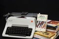 Vintage Olympia Arabic typewriter and used books. Royalty Free Stock Photo