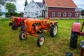 Vintage orange Allgaier tractor in a field..