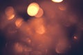 Vintage orange red warm bokeh with sparkling lights in dark orange colors as Christmas background Royalty Free Stock Photo