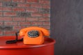 Vintage orange telephone - closeup Royalty Free Stock Photo